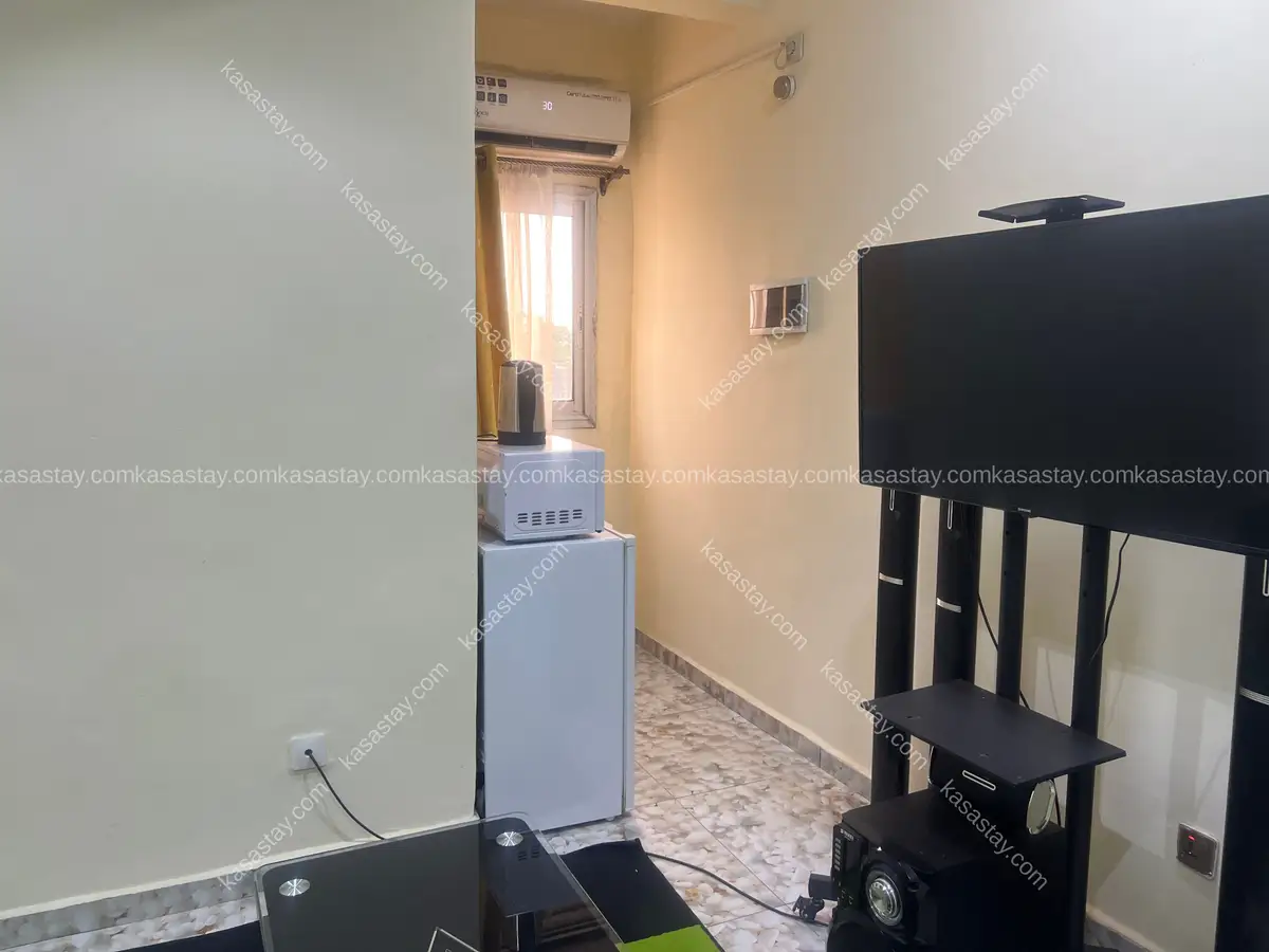 Studio meublé 303 by Versace guest house (nouvelle route cité sic) 4