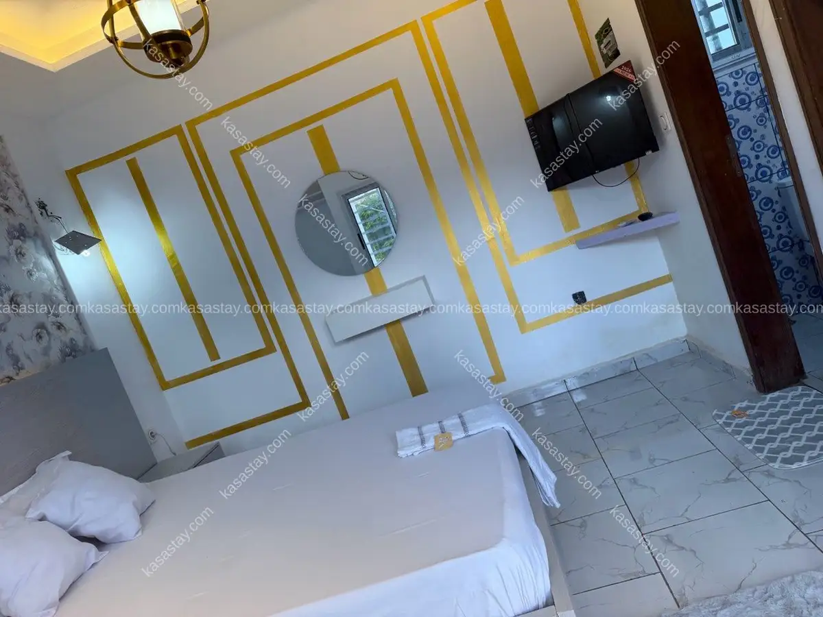 Rooms à Complexe BEAC, 1 chambre 2