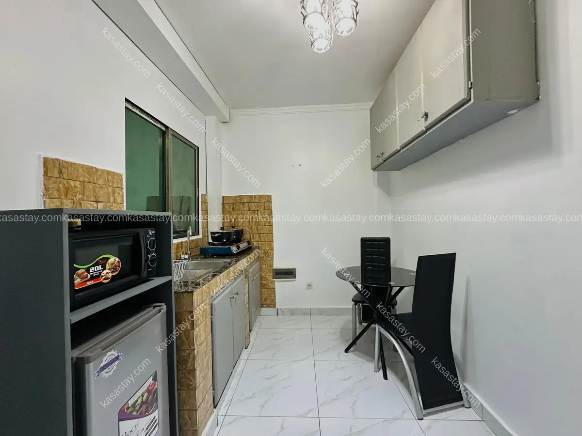 Studio PRESIDENTIEL par LR - Kotto Immeuble
