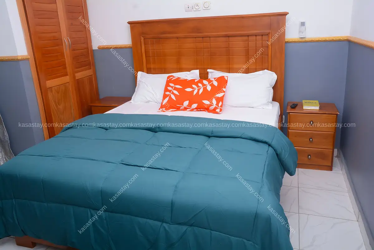 Chambre 07 Ajieh Rest House (Douala, LE'NDI Maison Blanche, en face école felyma)