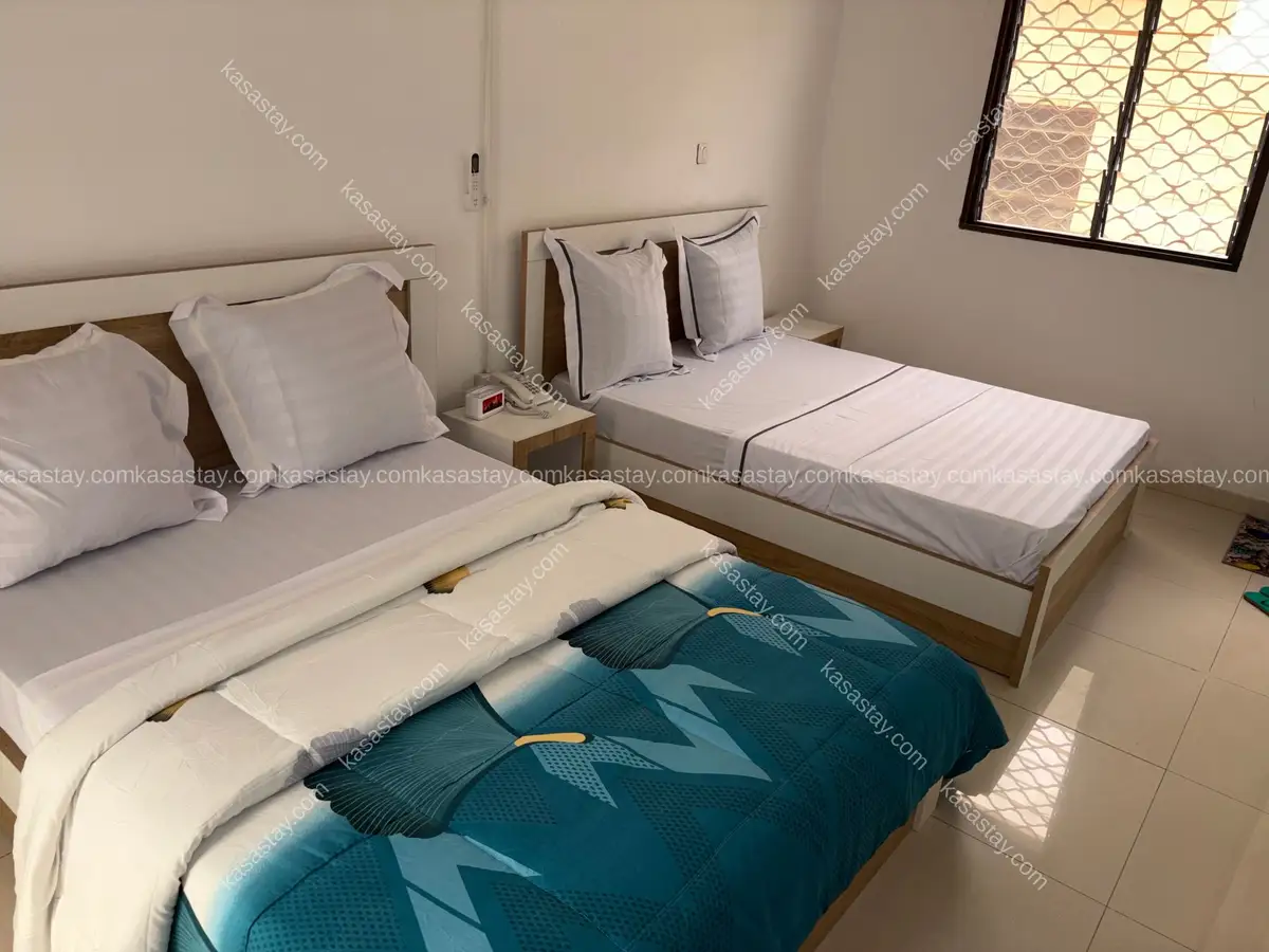 Chambre meublée 09 de LA VILLA DES CŒURS HEUREUX (bonamoussadi)