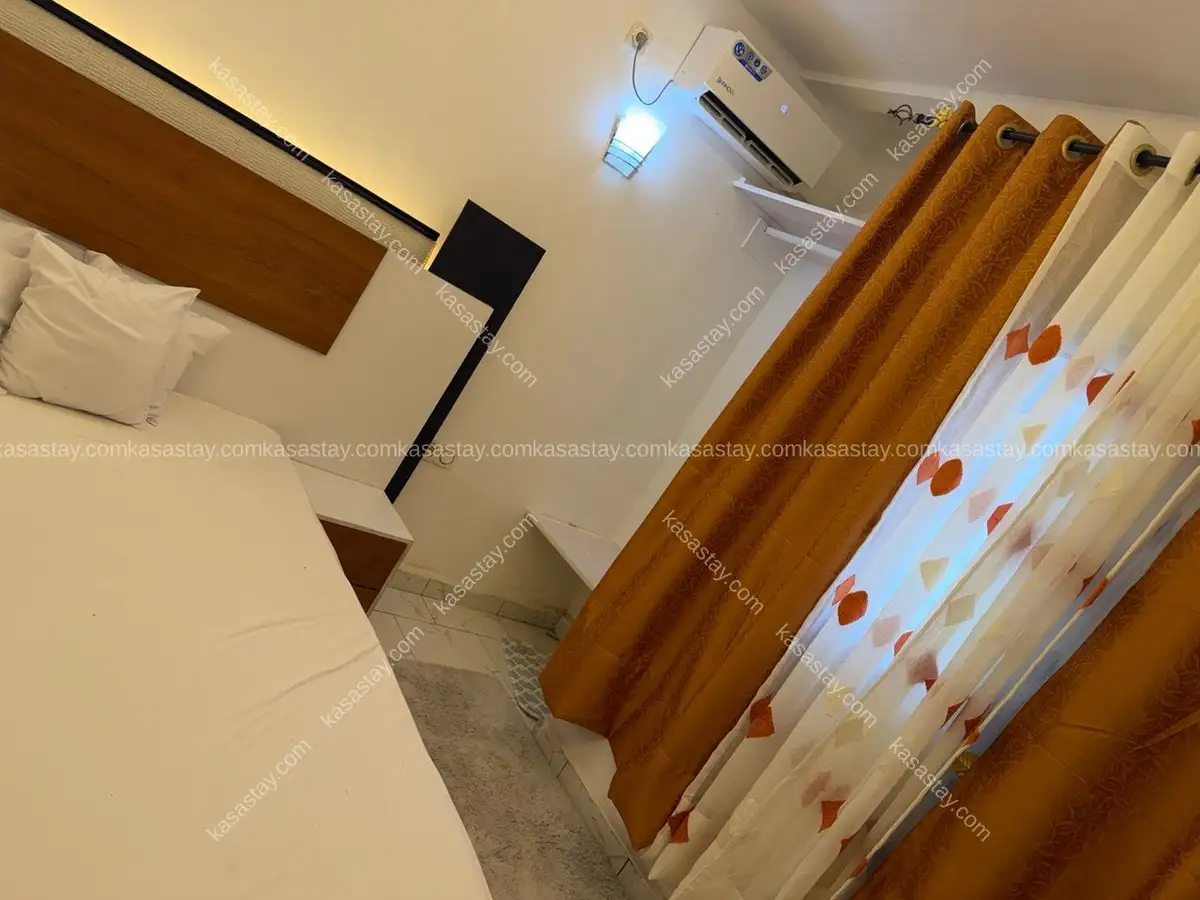 Rooms à Complexe BEAC, 1 chambre 3