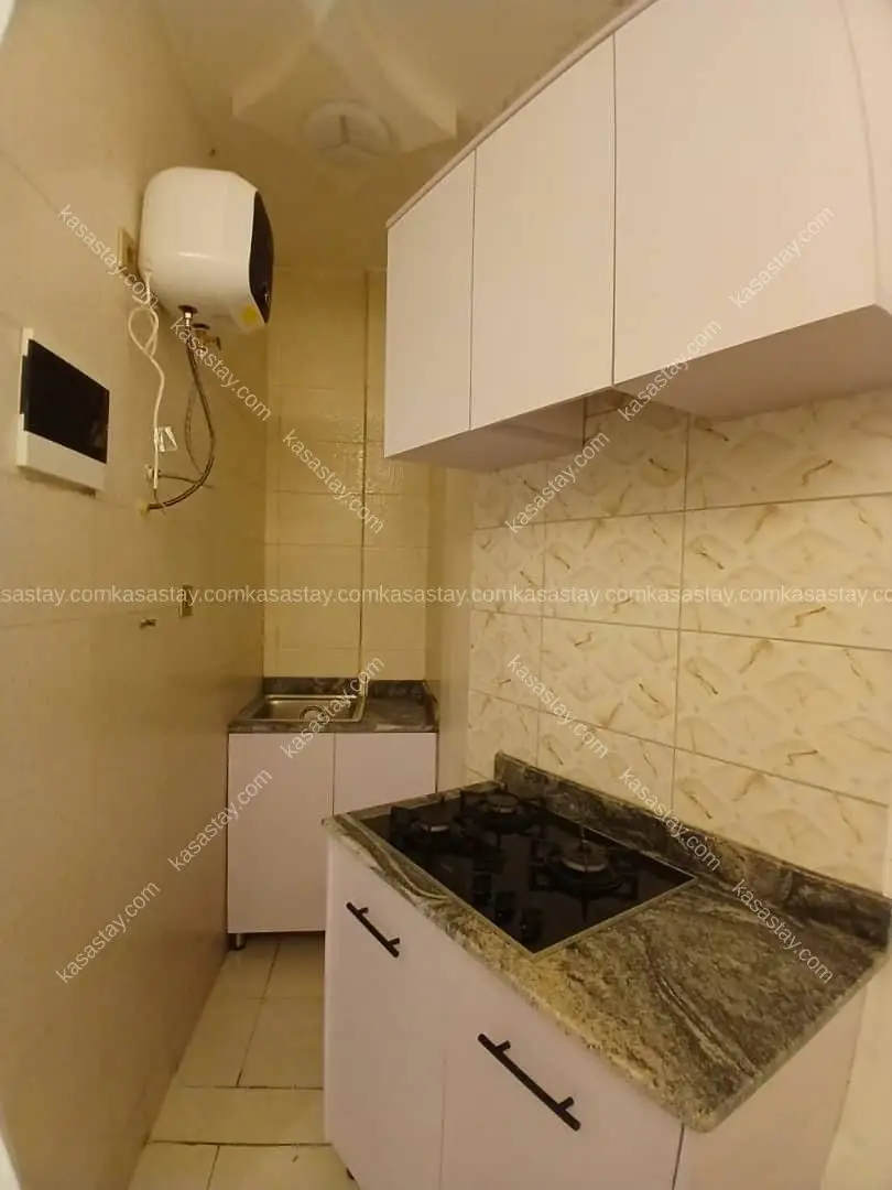 Chambre 101 by résidence kingdom tower ( makepe à côté de la station Jeff oil) 5