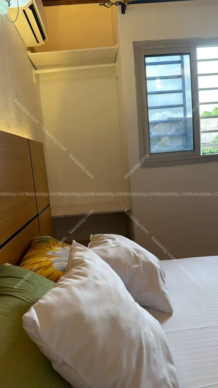 Rooms à Complexe BEAC, 1 chambre 4