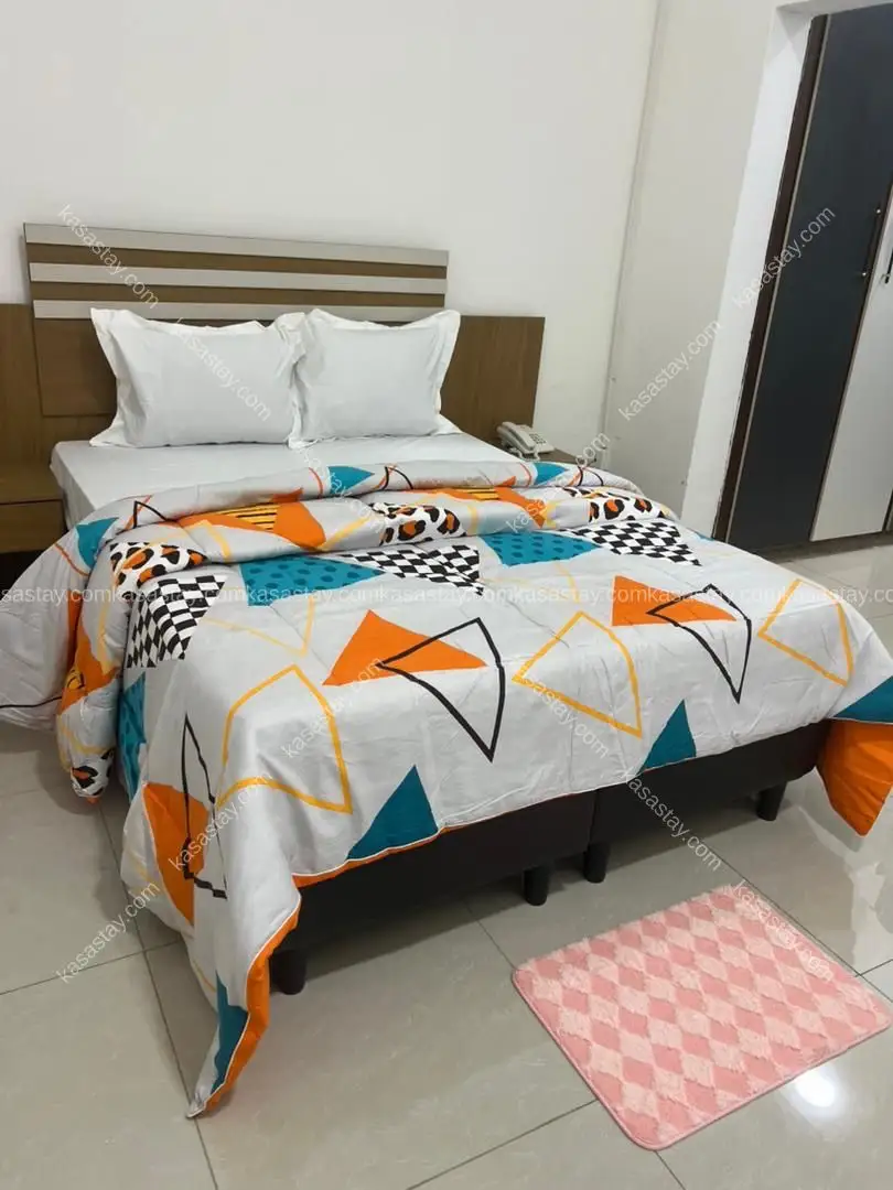 Chambre meublée 02 de LA VILLA DES CŒURS HEUREUX (bonamoussadi)